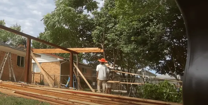 how to attach a patio roof to an existing house